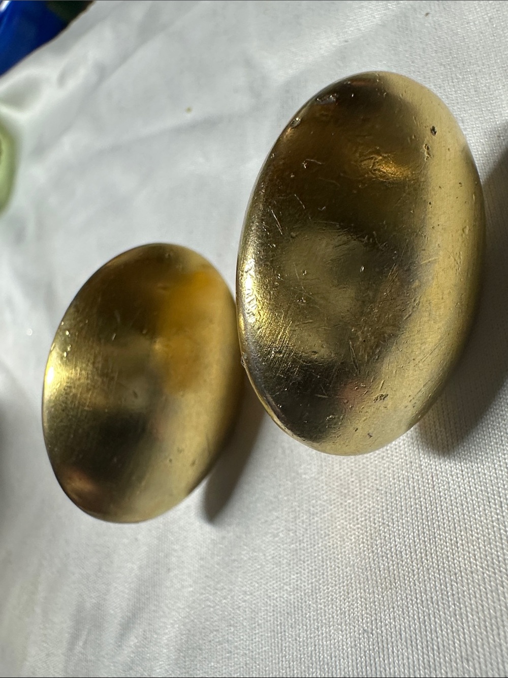 vintage clip-on earrings-Due to age a Little wear and tear
